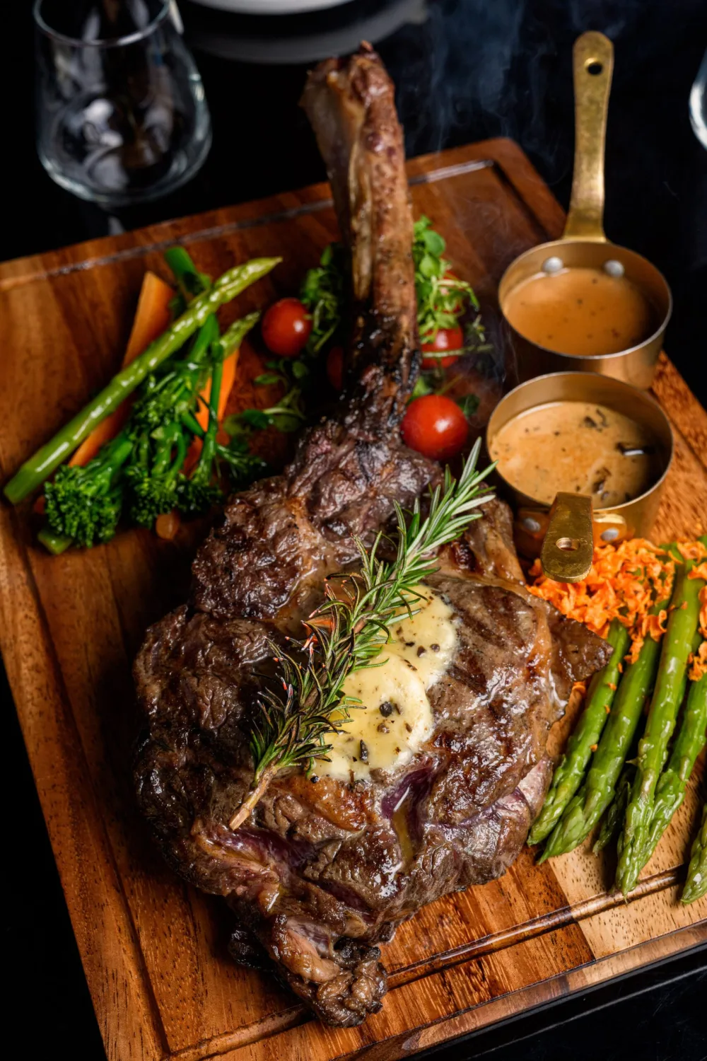 A dry-aged tomahawk on the board